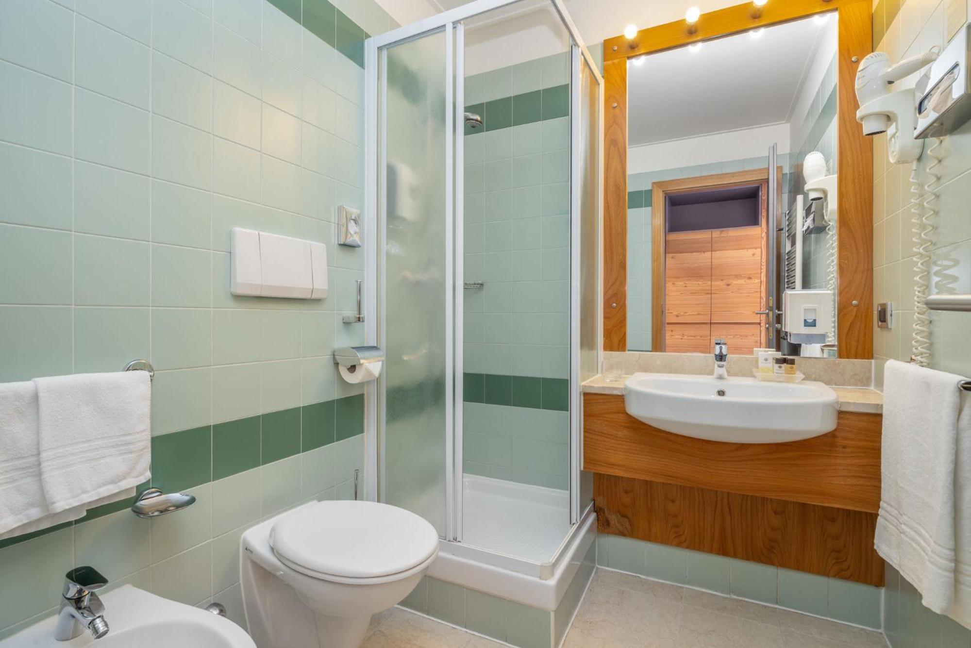 Alpholiday Dolomiti Wellness & Family Hotel Дімаро Номер фото
